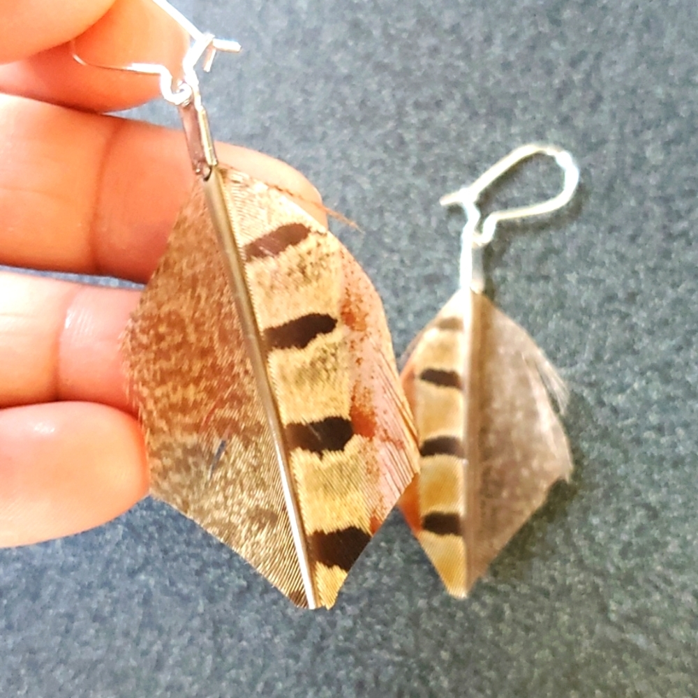 Cut feather earrings..